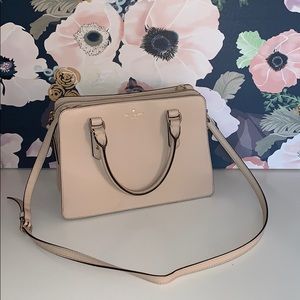 Cream colored Kate Spade bag. Gently used.